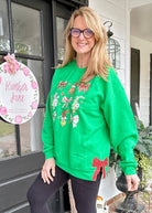 Coquette Grinch Side Glitter Applique' Bows Sweatshirt - Sweatshirt - Jimberly's Boutique - Olive Branch - Mississippi