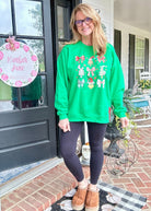 Coquette Grinch Side Glitter Applique' Bows Sweatshirt - Sweatshirt - Jimberly's Boutique - Olive Branch - Mississippi